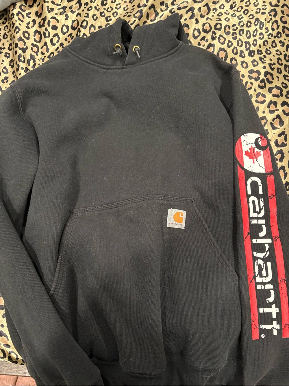 Limited edition Carhartt Black Hooded Sweatshirt with Canadian Sleeve Graphic
